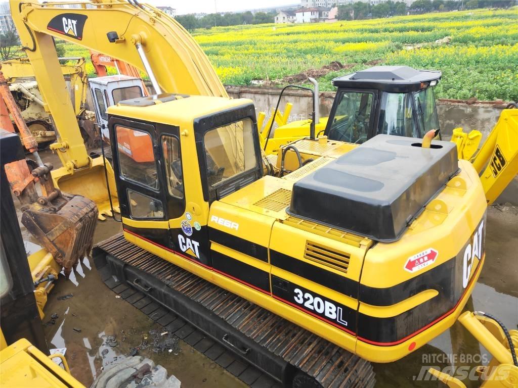 CAT 320B حفارات زحافة