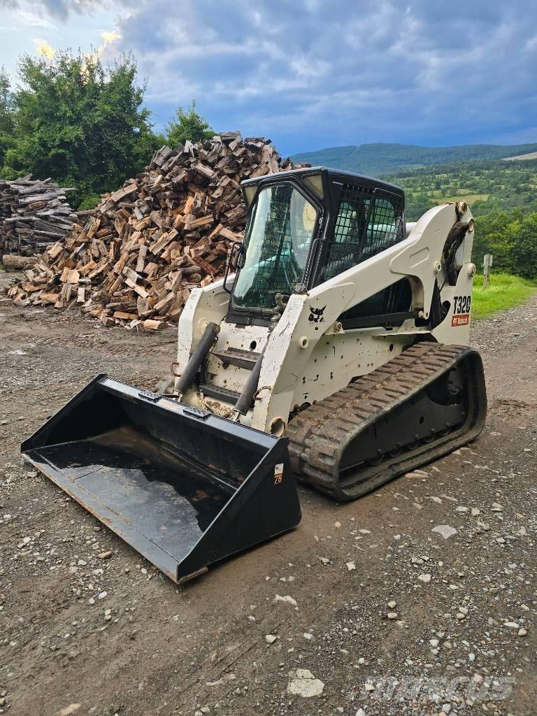 Bobcat T 320 لوادر انزلاقية التوجيه