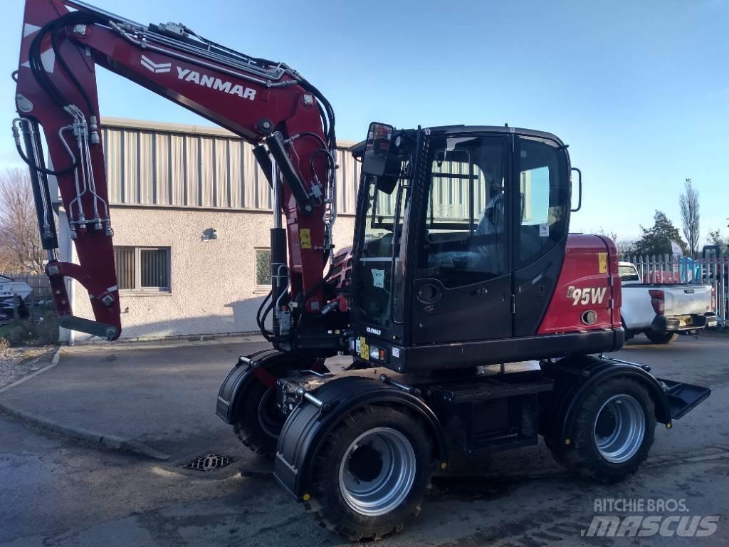 Yanmar B95W حفارات بعجل