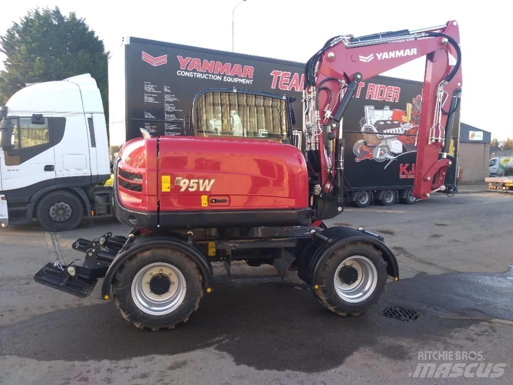 Yanmar B95W حفارات بعجل