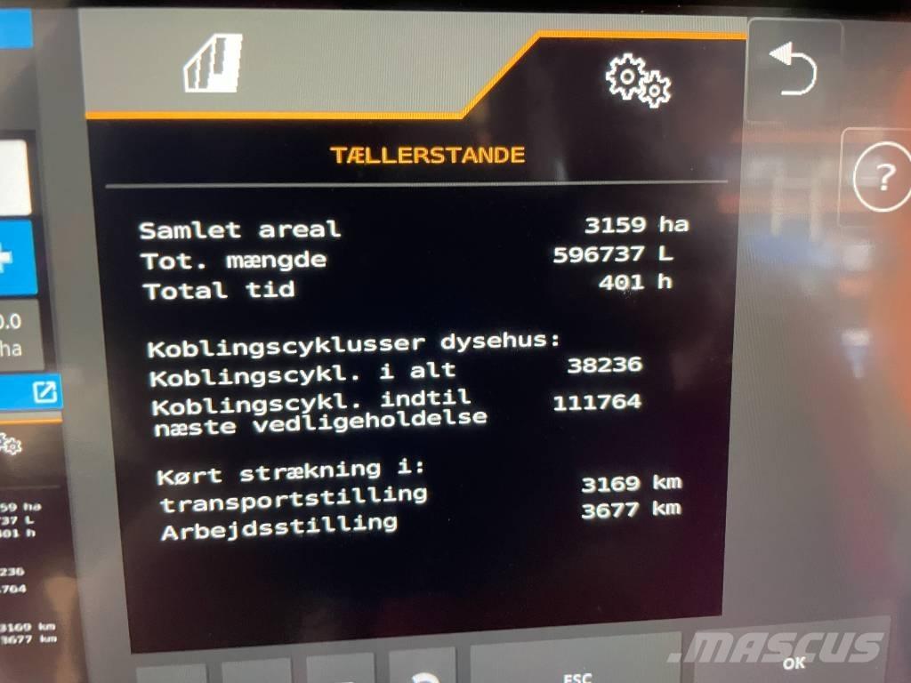 New Holland L520 حصادات