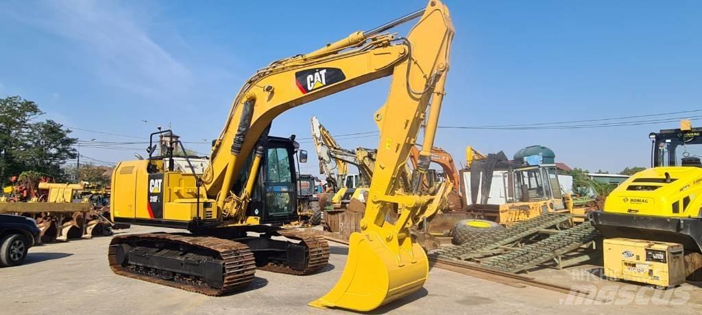 CAT 318FL حفارات زحافة