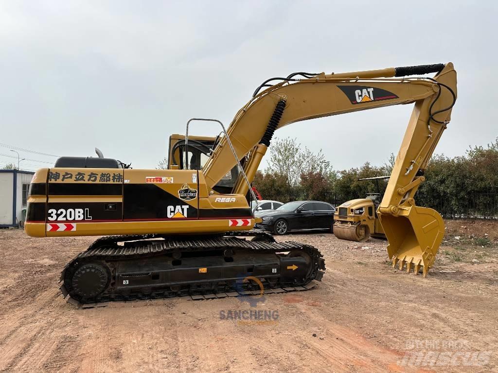 CAT 320 B L حفارات زحافة