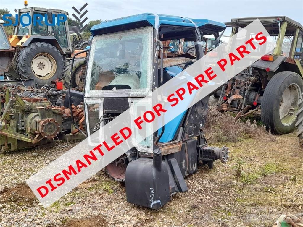 New Holland TS115 الجرارات