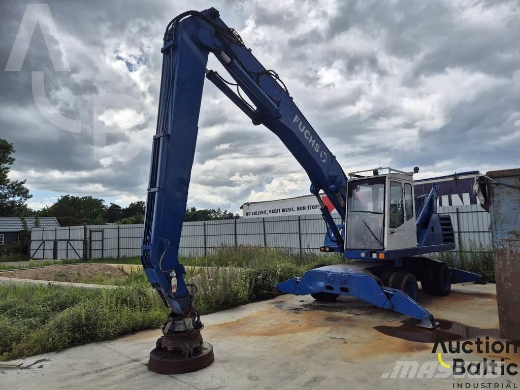 Fuchs MHL 331 حفارات بعجل