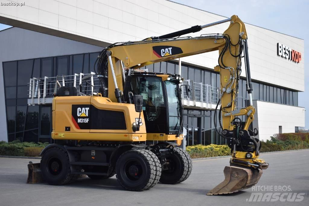 CAT M 315 F حفارات بعجل