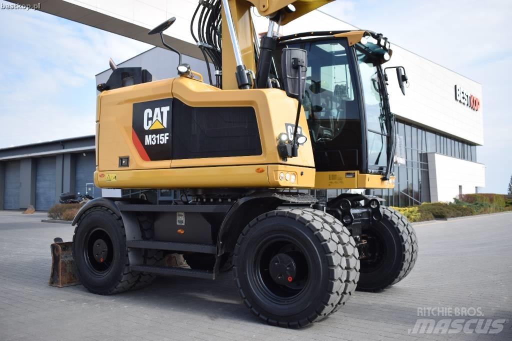 CAT M 315 F حفارات بعجل