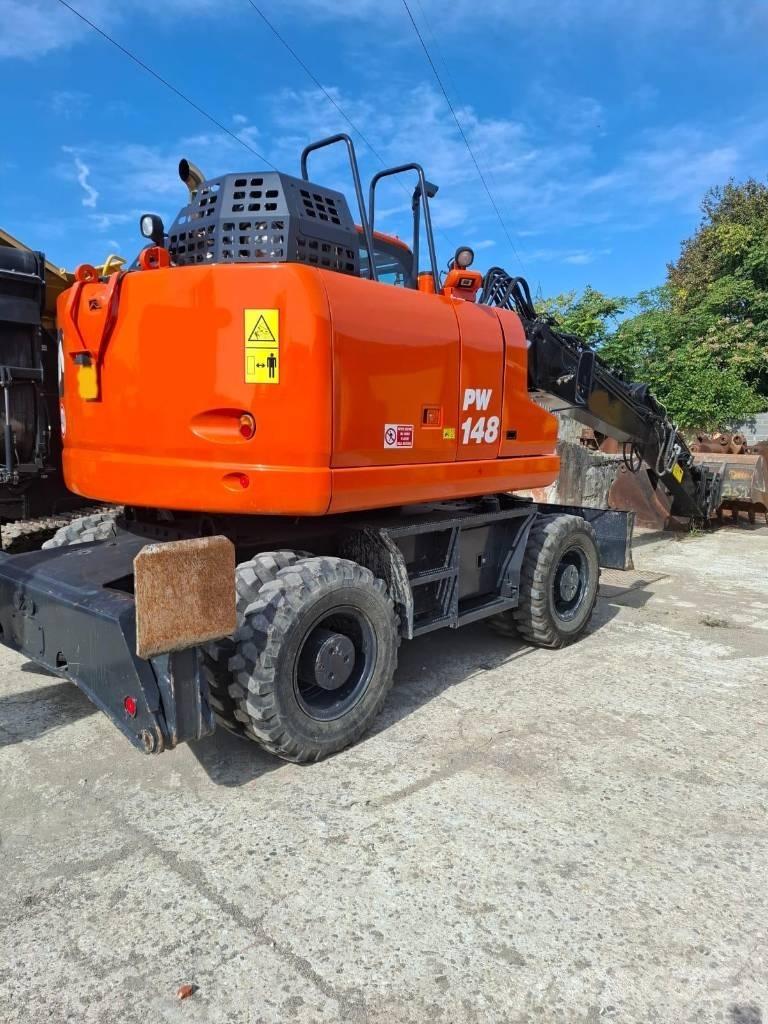 Komatsu PW 148-11 حفارات بعجل