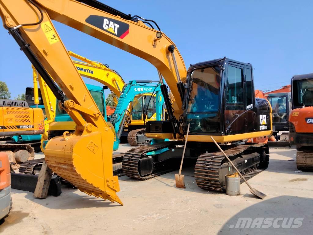 CAT 313 D حفارات زحافة