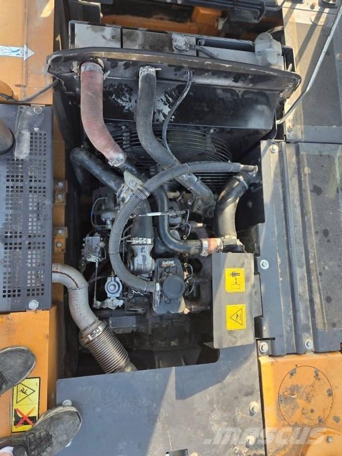 CASE WX 148 حفارات بعجل