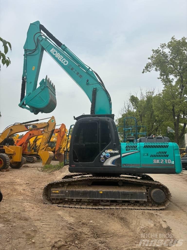 Kobelco SK 210 حفارات زحافة