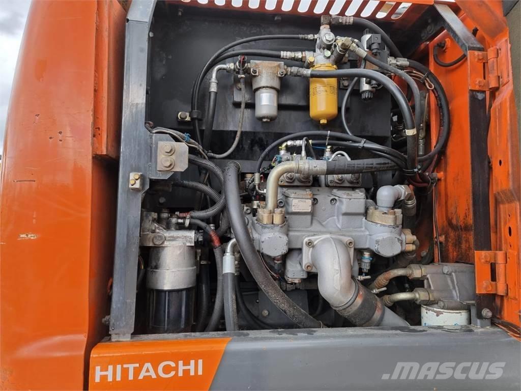 Hitachi ZX 140 W-3 حفارات بعجل