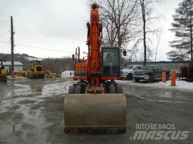 Doosan DX 140 W-3 حفارات بعجل