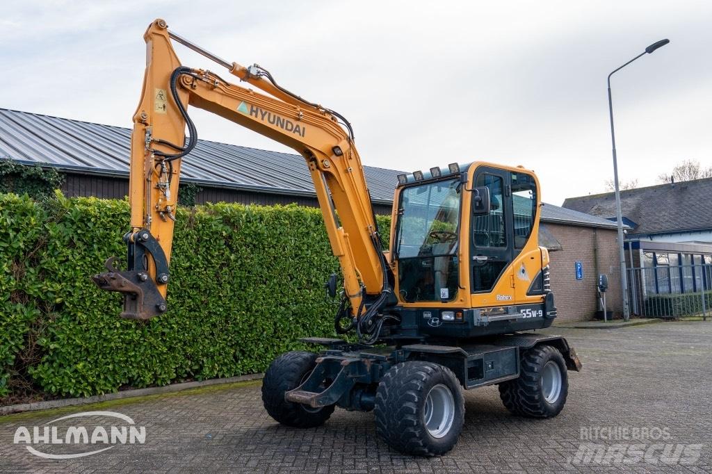 Hyundai R55W-9A حفارات بعجل