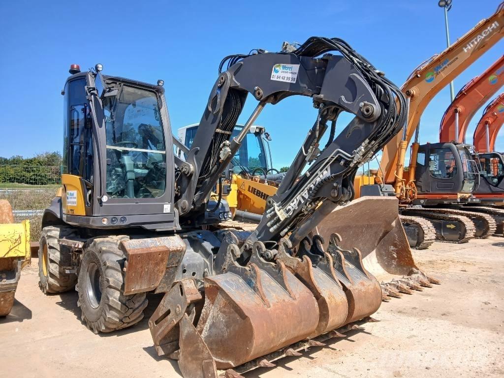 Mecalac 12 MTX حفارات بعجل