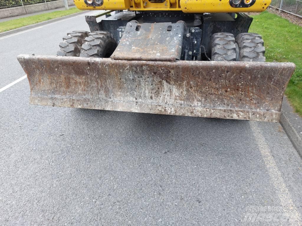 Komatsu PW148-11 حفارات بعجل