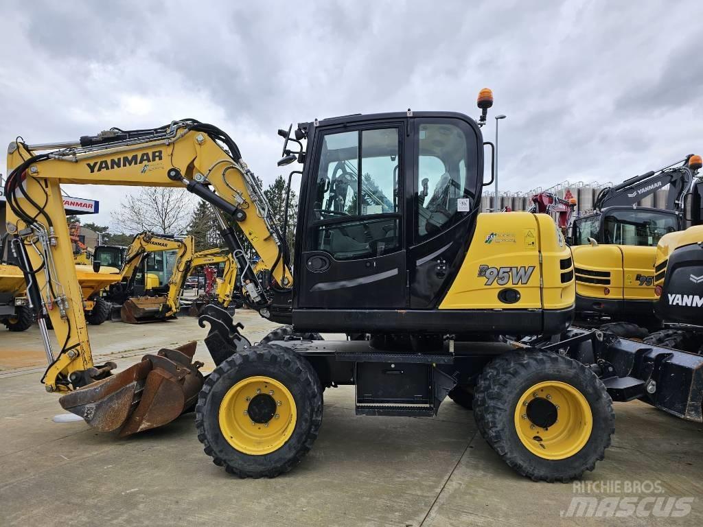 Yanmar B 95 W حفارات بعجل