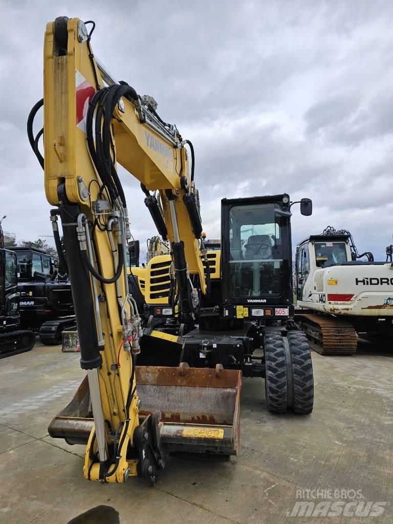 Yanmar B 95 W حفارات بعجل