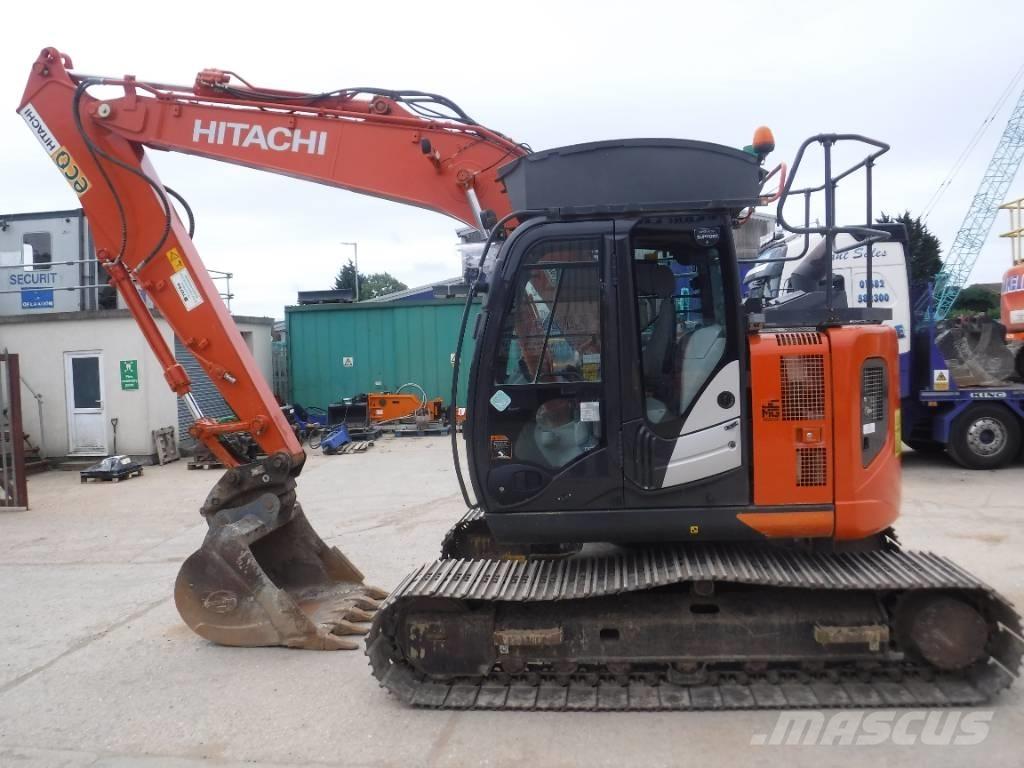 Hitachi ZX 135 US-6 حفارات زحافة