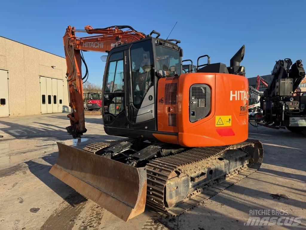 Hitachi ZX 135 US-6 حفارات زحافة