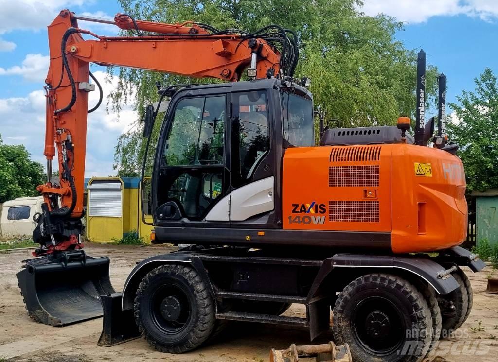 Hitachi 140W حفارات بعجل