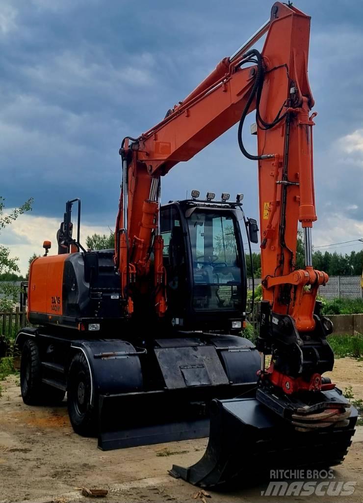 Hitachi 140W حفارات بعجل