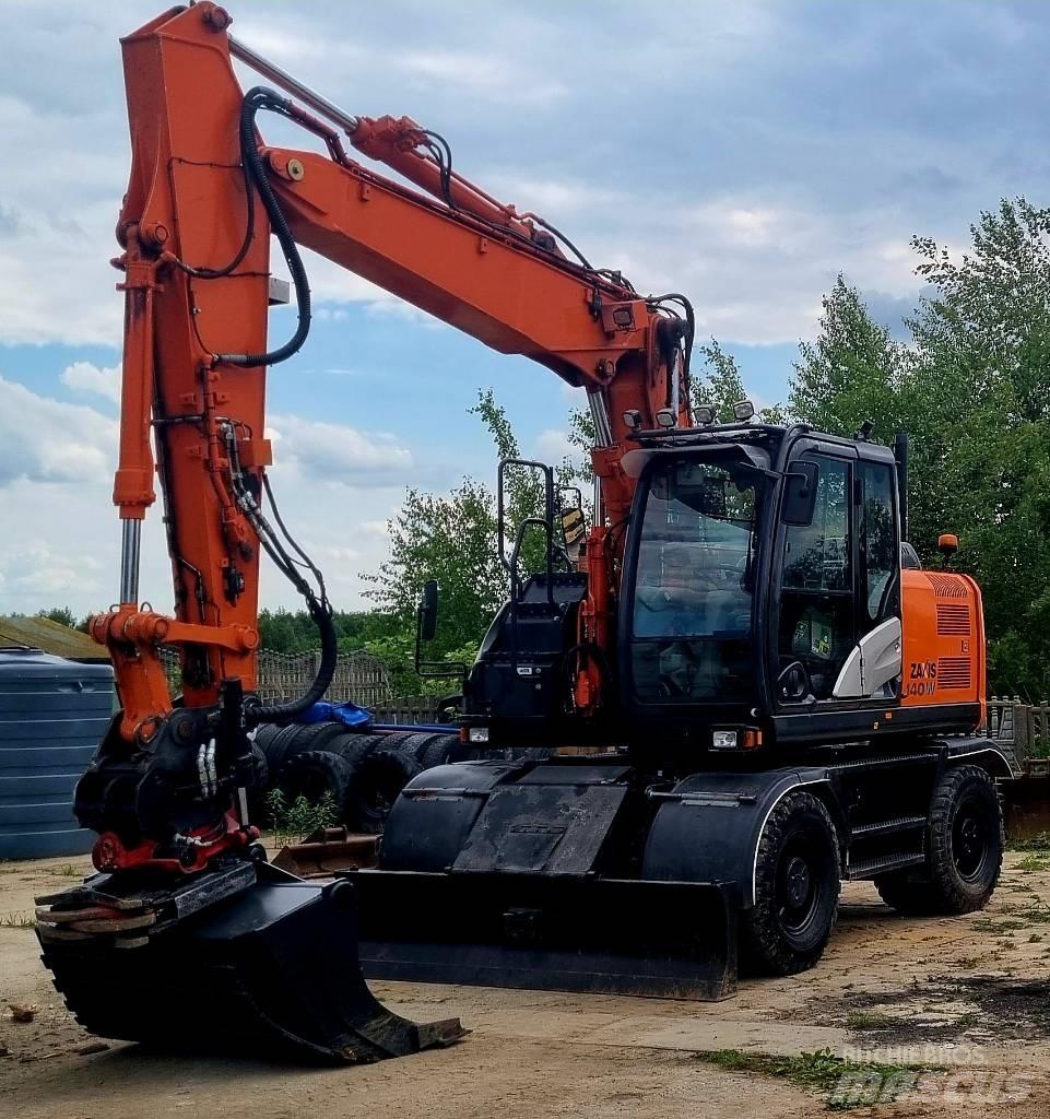 Hitachi 140W حفارات بعجل