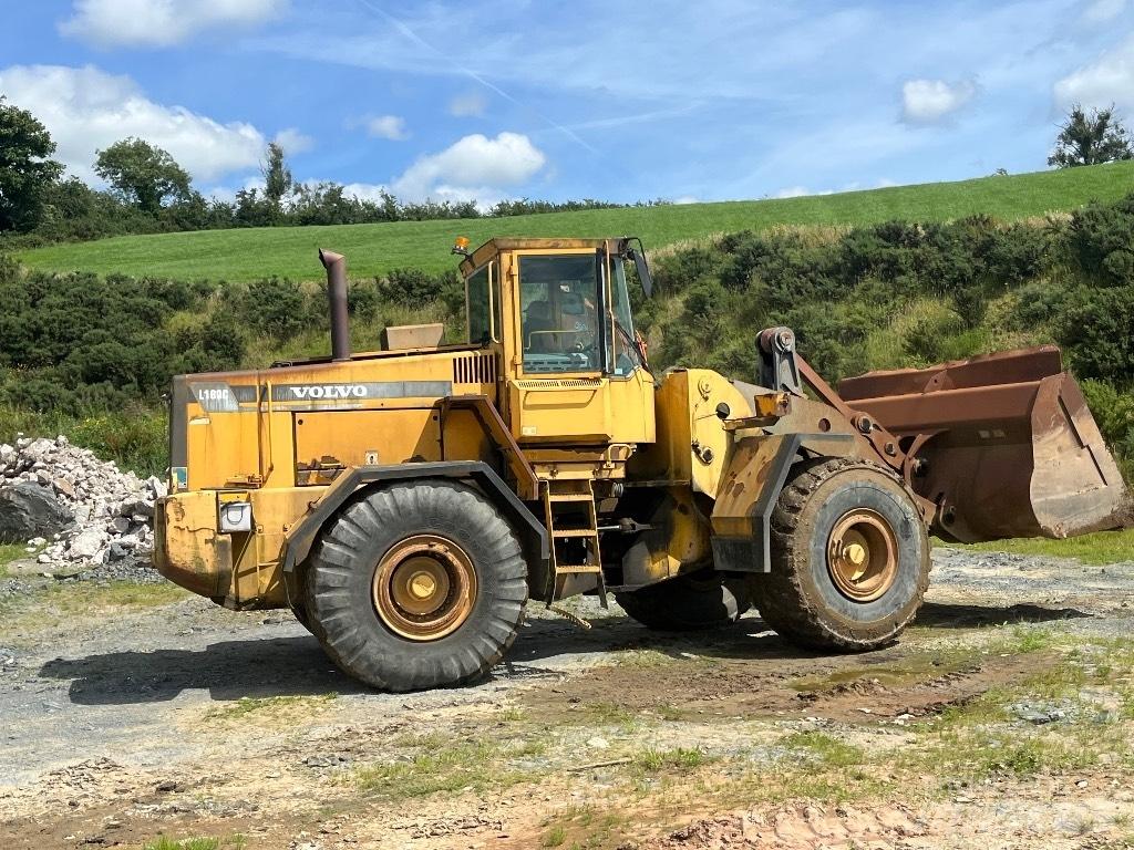 Volvo L180c لوادر بعجل