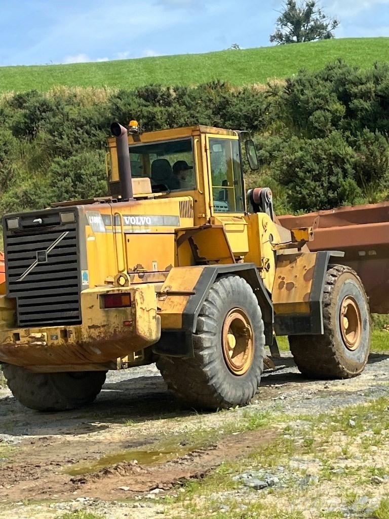 Volvo L180c لوادر بعجل