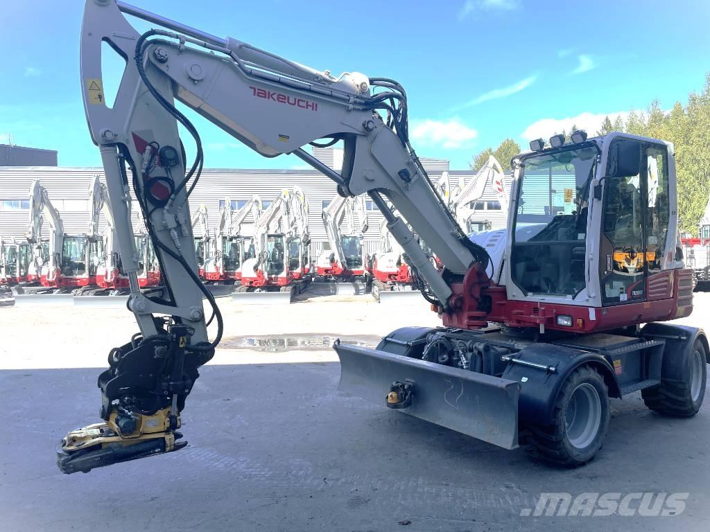 Takeuchi TB 295 W حفارات بعجل