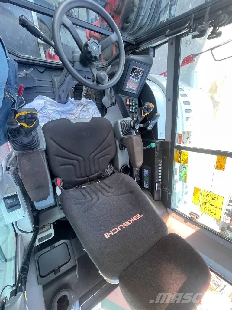 Takeuchi TB 295 W حفارات بعجل