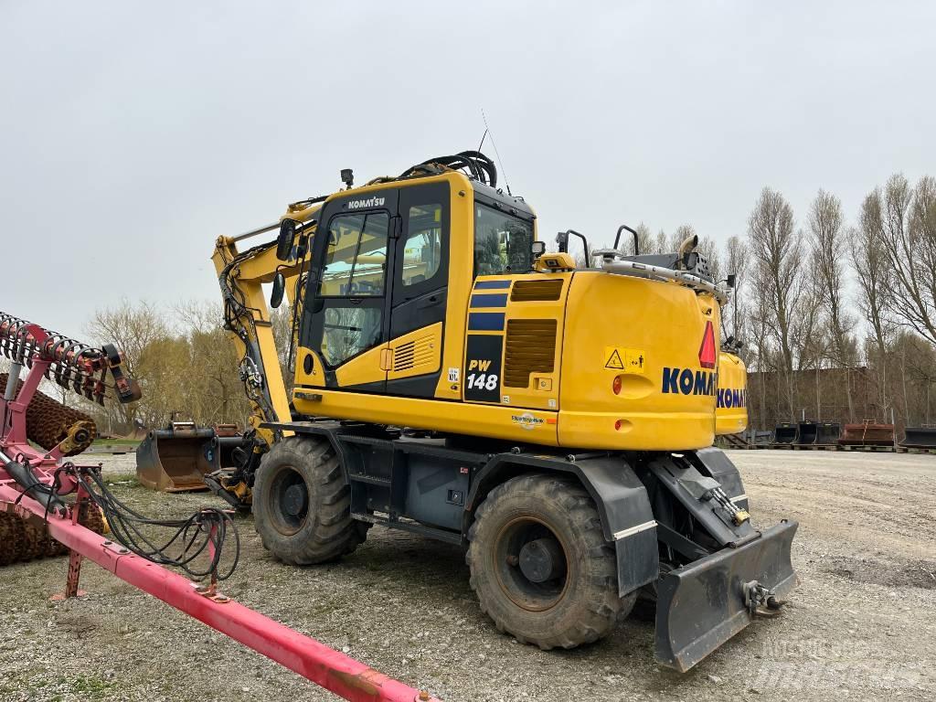 Komatsu PC 290 / PW148 حفارات بعجل