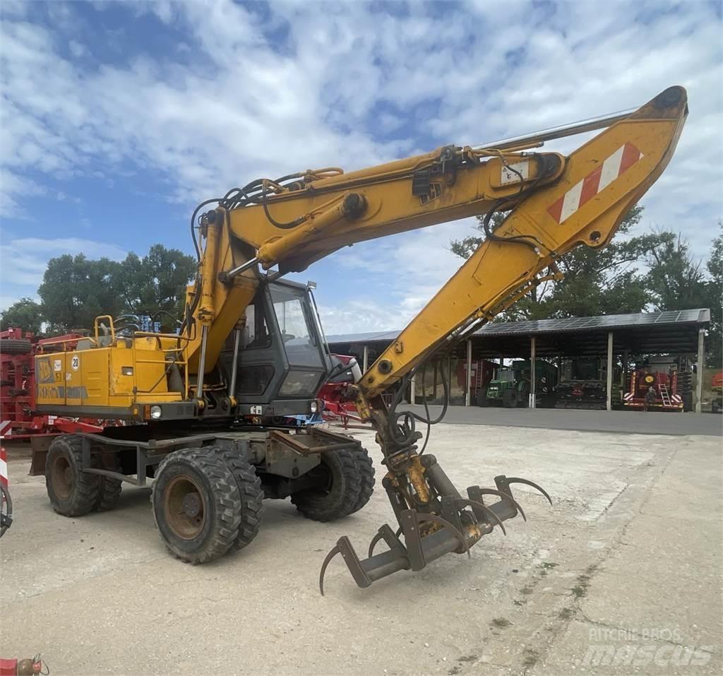 JCB 130 W حفارات بعجل