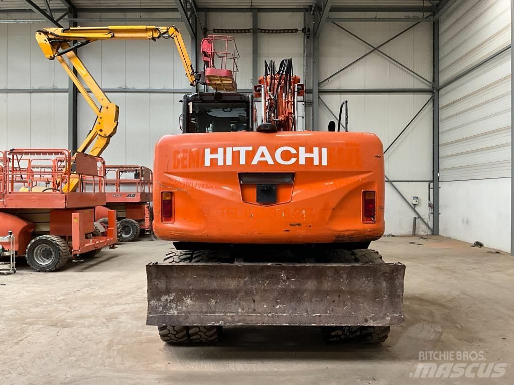 Hitachi ZX 140 W-3 حفارات بعجل