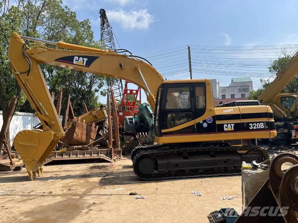 CAT 320 B L حفارات زحافة