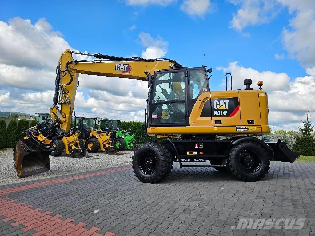 CAT M 314 F حفارات بعجل