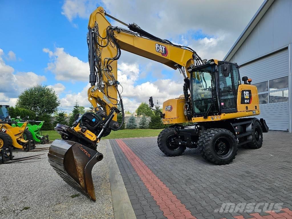 CAT M 314 F حفارات بعجل