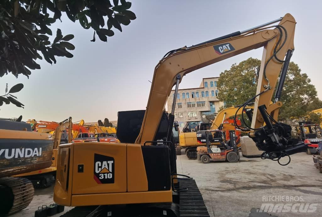 CAT 310 حفارات زحافة