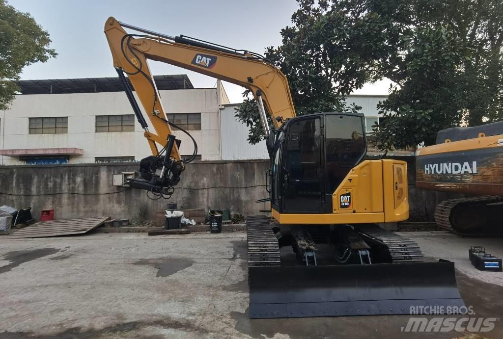 CAT 310 حفارات زحافة