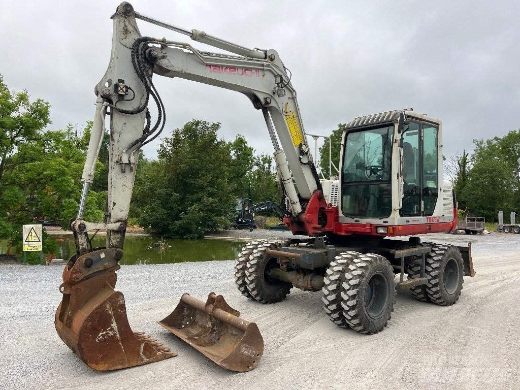 Takeuchi TB 175 W حفارات بعجل