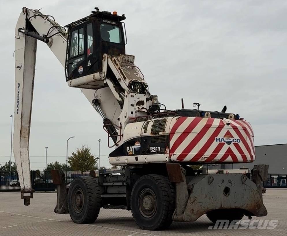 CAT M 325 D MH حفارات بعجل