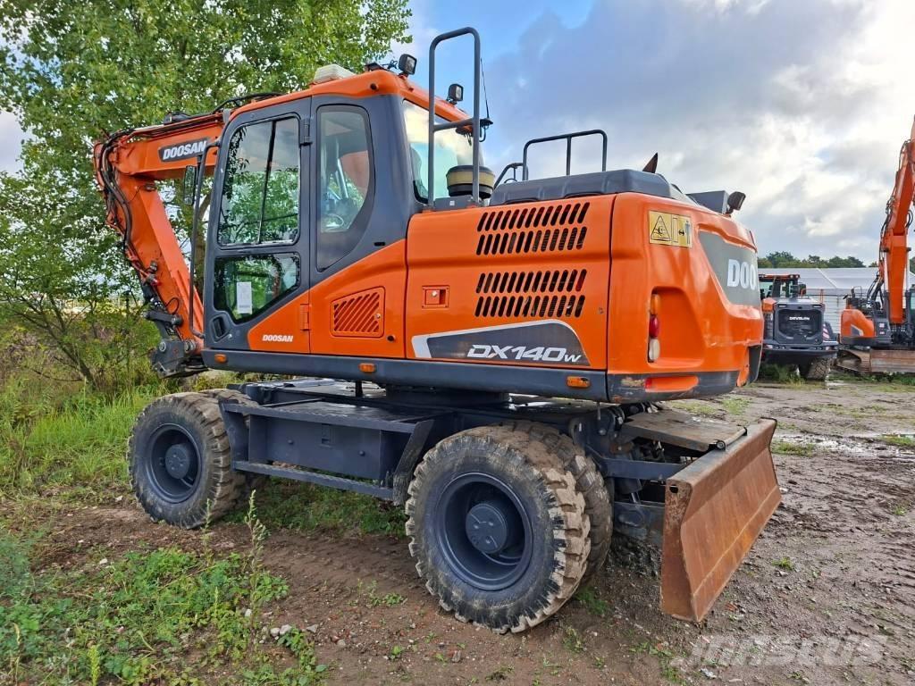 Doosan DX140W-5 حفارات بعجل