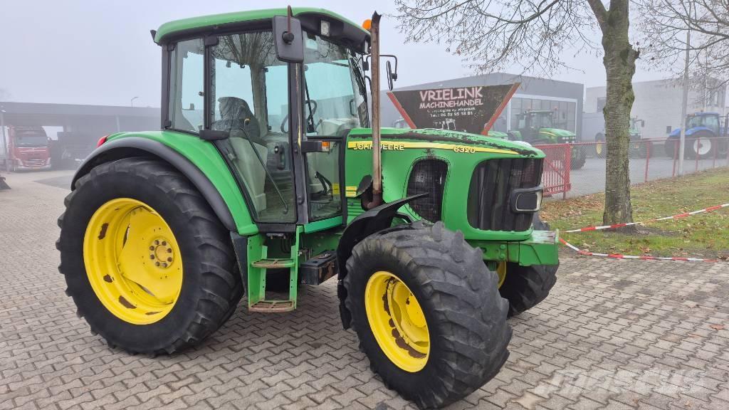 John Deere 6320 SE الجرارات