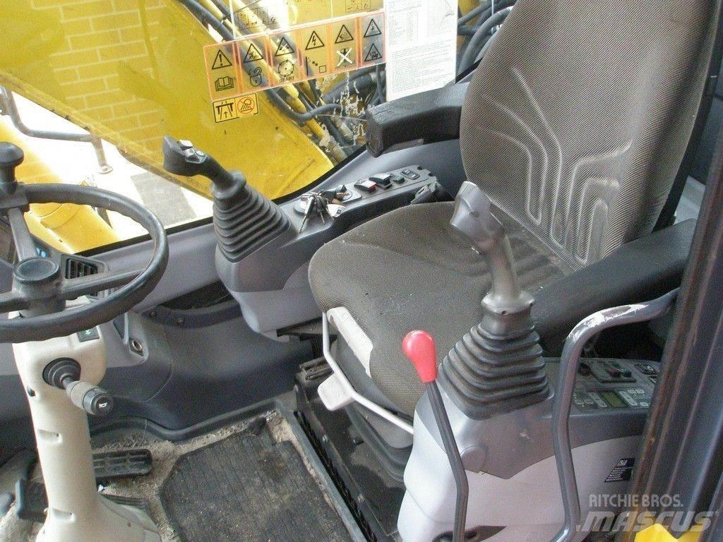 Komatsu PW140-7 حفارات بعجل