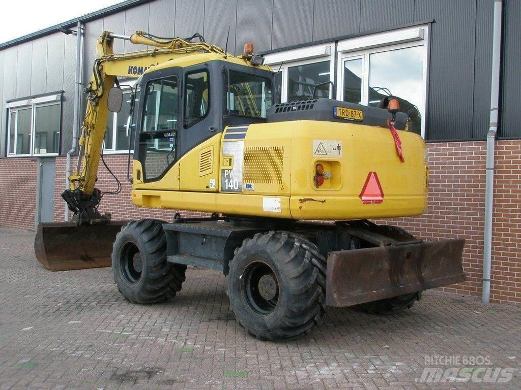 Komatsu PW140-7 حفارات بعجل