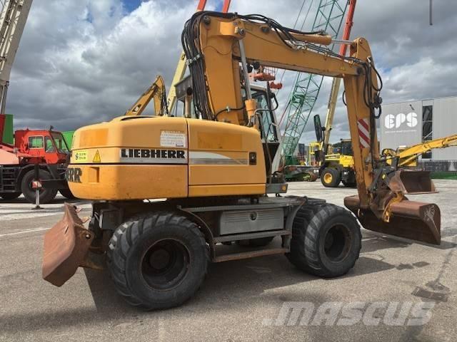 Liebherr A 314 حفارات بعجل