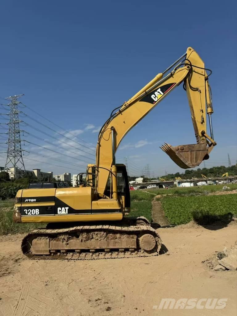 CAT 320 B حفارات زحافة
