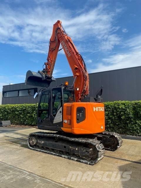Hitachi ZX 135 US-6 حفارات زحافة
