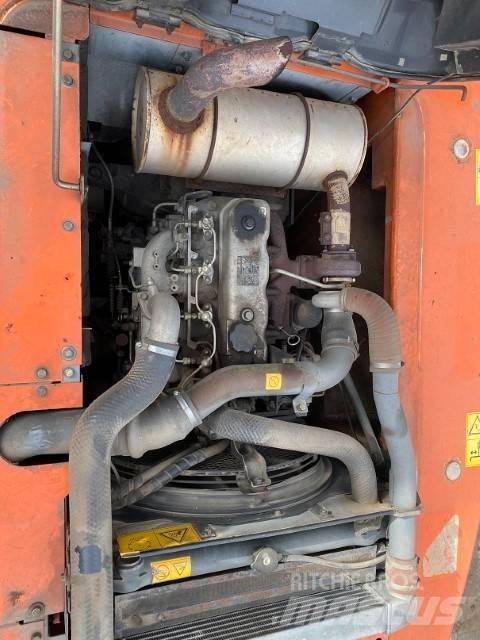 Hitachi ZX 180 W حفارات بعجل