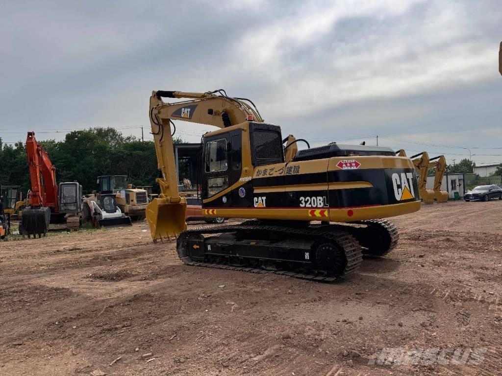 CAT 320B حفارات زحافة